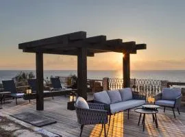 Luxury Villa over the Cliffs & Wild Beach by FeelHome
