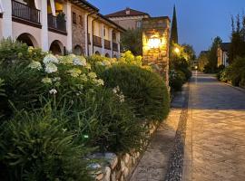 Green Living Apartment, golf hotel in Pozzolengo