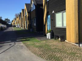 Feriehus i Søgne Sørlandet tilgang til basseng boblebad badstu, hotel in Kristiansand