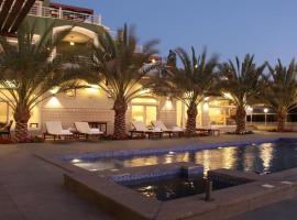 Golden rays chalet, hotel in Madaba