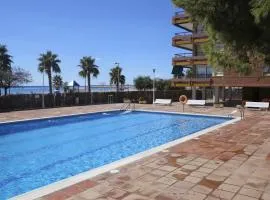 AT041 Els Pins, primera línea de la playa, con piscina