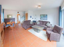 Ferienhaus Wattwurm 1, FeWo Vermittlung Nordsee, Hotel in Dangast