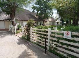 THATCH HAVEN GUEST HOUSE, alquiler vacacional en Mahikeng