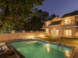 StayVista's Enchanting Haven - Modern Interiors, Sprawling Lawn with Gazebo, Swimming Pool, Indoor Games