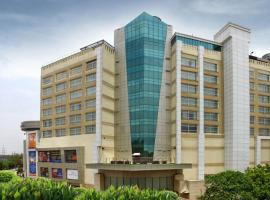 Mahagun Sarovar Portico Suites, hotelli kohteessa Ghaziabad