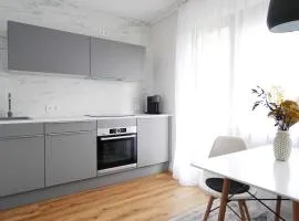 Apartment mit Balkon und Privatparkplatz