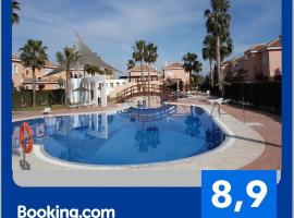 Homes of Spain, Casa Duplex Playas del Sur, 400m del mar , WIFI, dovolenkový dom v destinácii Playas de Vera