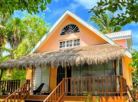 The Coral Casa, cottage in Caye Caulker