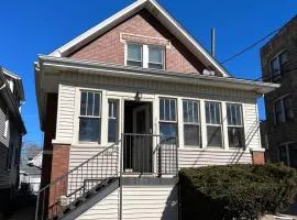 Sunny 2 BR Apartment west of Chicago in quaint Forest Park center