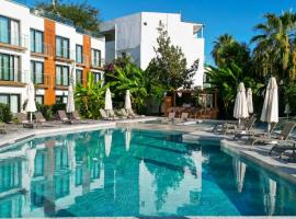 Bodrum Astrid Hotel, hotel amb piscina a Gümüşlük