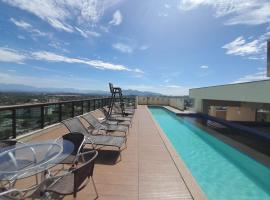 Flat moderno com piscina e academia, hotel in Itaboraí