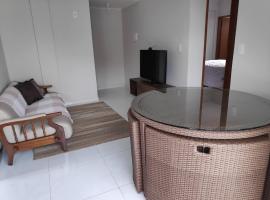 Apartamento Ar condicionado, varanda, 2 vagas garagem – apartament w mieście Muriaé