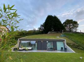 La Casa de Hierba - Casa de campo de diseño con jardín y wifi cerca de las playas de Llanes, căsuță din Llanes