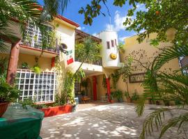 La Casa Del Almendro, quarto em acomodação popular em Playa del Carmen