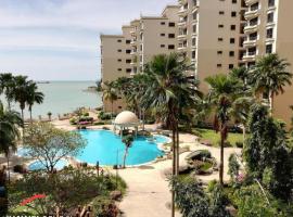 Melaka Family Beachfront, alojamento para férias em Kampong Lereh