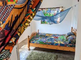 Chambres d'hôtes - Chez Mama Sêdjro, hotell i Porto-Novo