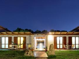 Sardinia Green Park Country Lodge, σαλέ στην Όλμπια