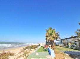 Un paso hacia el mar, cabaña o casa de campo en Chipiona