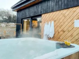 Projekt ŚWIT - domki z prywatną jacuzzi i sauną