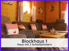 Der Fuchsbau - 3 separate Blockhäuser - ruhige Lage - 50m bis zum Wald - eingezäunter Garten, hotel with parking in Bad Sachsa
