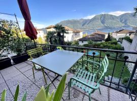 la meta appartamento vista lago con parcheggio, hotel en Minusio