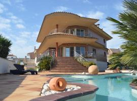 Villa Mar i Vent, cabaña o casa de campo en L'Ampolla