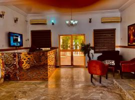 E-Gold Luxury Hotel, Maitama, отель рядом с аэропортом Nnamdi Azikiwe International Airport - ABV в Абудже