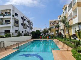 Agreable appartement dans une résidence calme sécurisée, hotell i El Harhoura