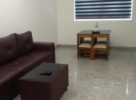 Redbell suites Residency, hotel in Kondotti