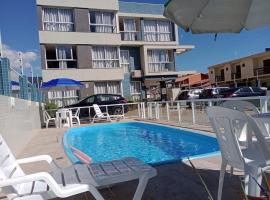 Residencial Provincia Di Trento Beira Mar, παραλιακό ξενοδοχείο σε Torres