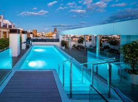 nQn Aparts & Suites Sevilla, alojamiento con cocina en Sevilla