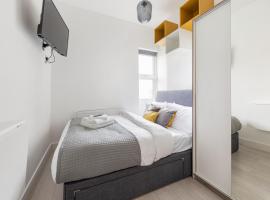 Functional Budget Stay with Wi-Fi and Laundry Facilities near Tube Station