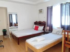 RNA Guesthouse, hotel a Moalboal