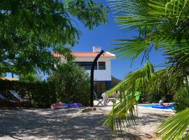 Trendy casa de Ferias, hotel with pools in Monte da Pedra Alva