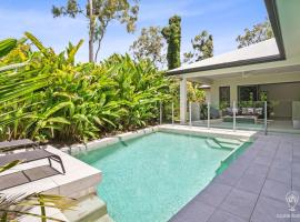 House Heliconia - Luxury Living in Palm Cove, obiteljski hotel u gradu 'Palm Cove'