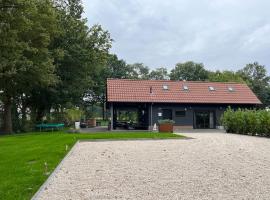 Landelijk gelegen vakantiehuis met hottub!, Ferienunterkunft in Tollebeek