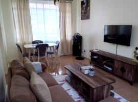 Tranquil haven - spacious, cozy, 1 bedroom, hotel near Kibuye Market, Kisumu