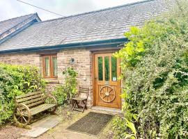 RURAL stone barn with Log Burner, tranquil setting, hotel in Usk
