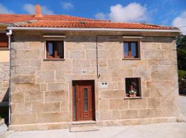 Casa CuadranteCasa de piedra en playa de Carnota, smještaj uz plažu u gradu 'Pedrafigueira'