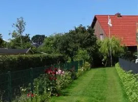 Ferienhaus im urigen Garten bzw Eulenhaus