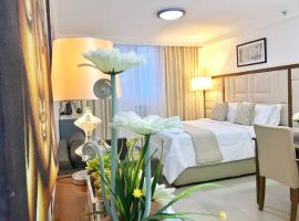Attractive studio with Luxury bed Good for 1-4pax High speed WiFi with Netflix Free Pool & Parking, hotel in Suba