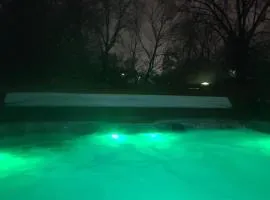Outdoor Hot Tub and Cozy King Bed