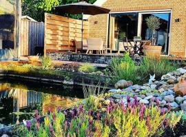 The Barn - Aurora Hoeve - loft met jacuzzi, hotel med boblebade i Oldekerk