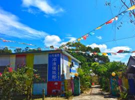 Wan Ning Xiao Gang Guest House, hotel di Wanning