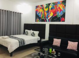 EZ Guesthouse, hotell i Phnom Penh