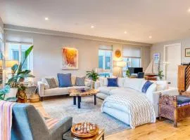 Walk to Empower Field Townhome with Hot Tub!