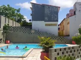 Flats no FORTE 200m praia ar piscinas portaria 24H