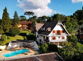 Casa Três Rios - Campos do Jordão, δωμάτιο σε οικογενειακή κατοικία σε Campos do Jordão