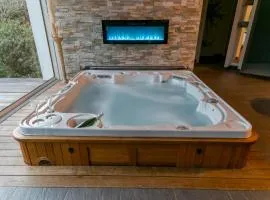 Charmante maison avec spa, sauna et jardin privatif