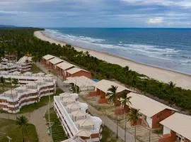 Apto em condomínio na praia, com terraço, em Ilhéus-BA
